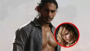 A muscular man standing